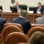 Session of Government. Conference room or seminar meeting room in business event. Academic classroom training course in lecture hall. blurred businessmen talking. modern bright office indoor