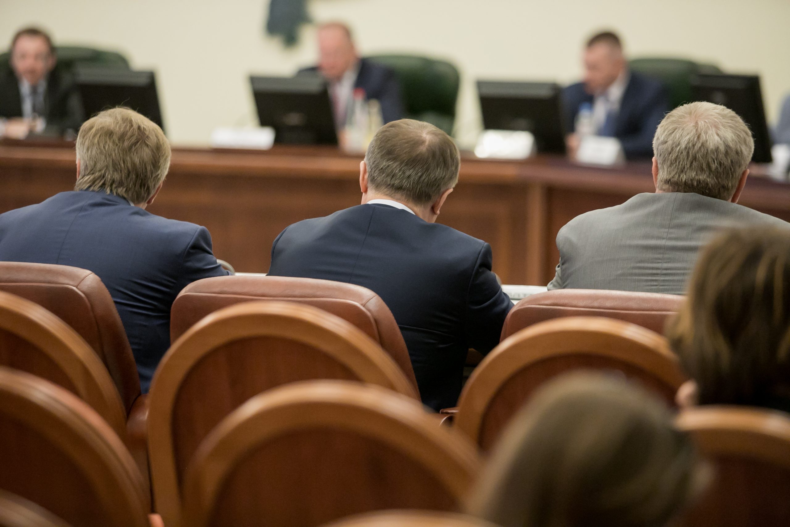 Session of Government. Conference room or seminar meeting room in business event. Academic classroom training course in lecture hall. blurred businessmen talking. modern bright office indoor
